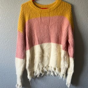 Tri-color fuzzy sweater.